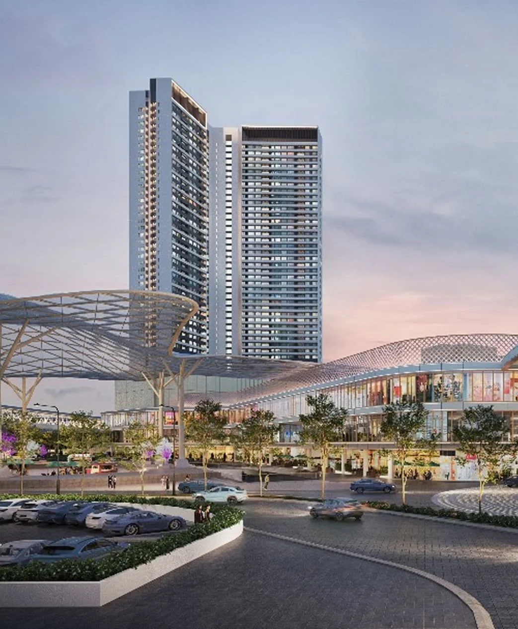 Park Green facade rising above the Pavilion Bukit Jalil mall at dusk